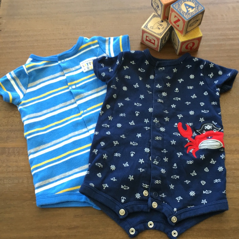 Two newborn rompers by Carter 🦀